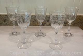 Sold at Auction: 11 Vintage Etched Stemmed Water Glasses