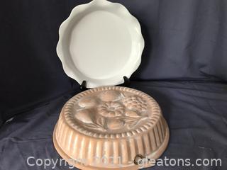 Crate and Barrel pie plate, clay cake pan