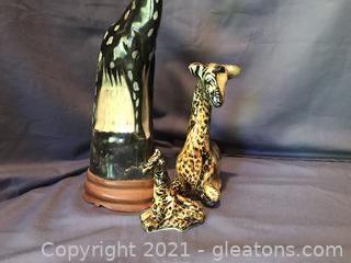 Three Giraffes large one is carved from horn