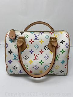 Sold at Auction: LOUIS VUITTON Multicolor Wallet Unauthenticated
