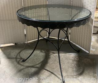 Glass Top Round Dining Table with Scroll Edges