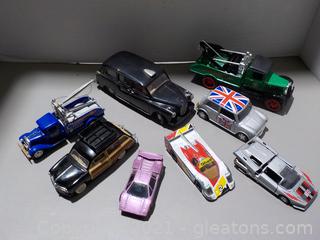 8 – Piece Group of Varied Size and Purpose Diecast Cars.