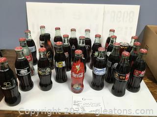 23 Coca-Cola Collectors Bottles + 1 Can - Disney, Sports & More!