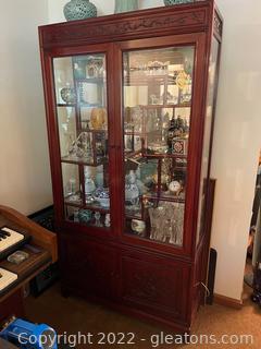 Curio/Display Cabinet with Beveled Glass, Carved Wood, & Bottom Storage 