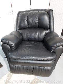 Nice Black Leather Look Recliner-Swivels and Rocks 