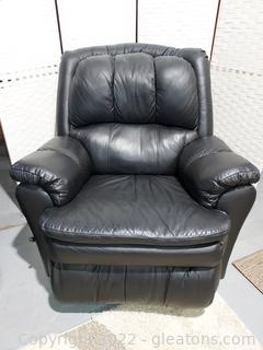 Nice Black Leather Look Recliner Swivels and Rocks 