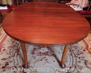 Gorgeous Antique Queen Anne Oval Dining Table
(See Lot 7002B for table extension) 