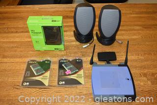Computer Speakers- Linksys Wireless Router – Memory Cards- Portable Hard Drive 