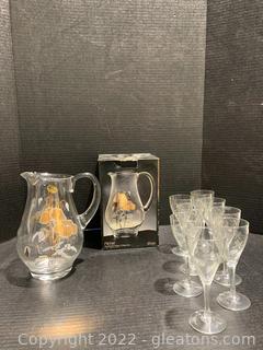 Mouth blown 12 k Gold Floral Pitcher and Eight Etched Sherry Glasses