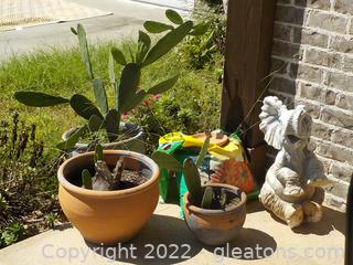 Another Flower Bed Group with a Cute Elephant, and About 6 Pots;
Some Pots not shown; They are on the front side of the porch