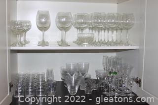 2 Shelves of Crystal Clear Wine Glasses & Other Glass Wear