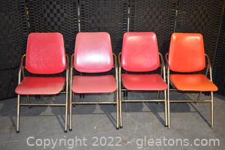 Four Faded But Functional Retro Vinyl Folding Chairs 