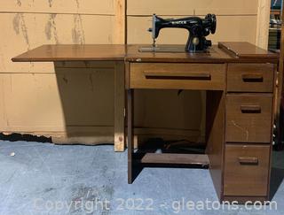 Singer Sewing Machine in Mid Century Cabinet 