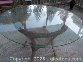Very Nice Patio Table-Rattan Base with Glass Top In Screened Deck Out Back 