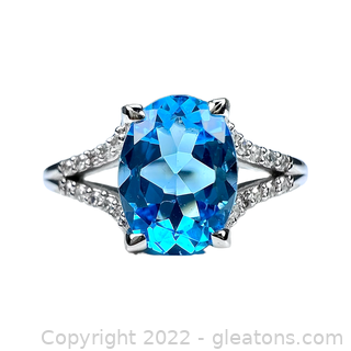 Brand New Blue Topaz and Diamond 14K Ring