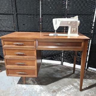 Singer Sewing Machine in Cabinet Includes Sewing Notions 