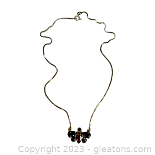18Kt Yellow Gold Garnet Butterfly Stationary Necklace