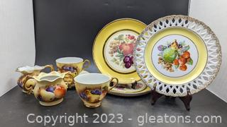 Japan Inarco Tea Cups, Saucers, Sugar & Creamer, and 3 Unique Plates 