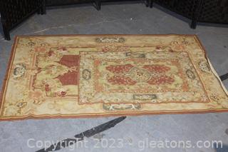 Two Floral Area Rugs