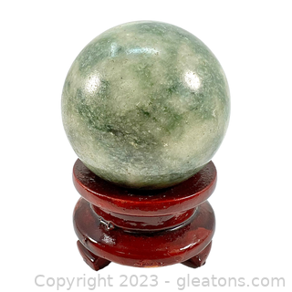 Green Jasper Gemstone Sphere on Wooden Base