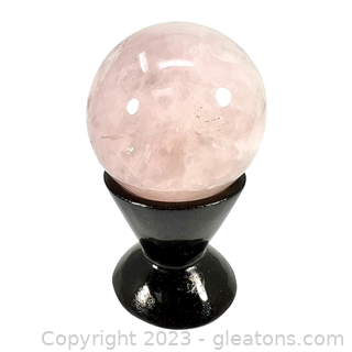 Rose Quartz Gemstone Sphere on Black Base