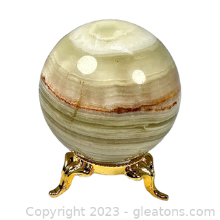 Banded Calcite Gemstone Sphere on Golden Base