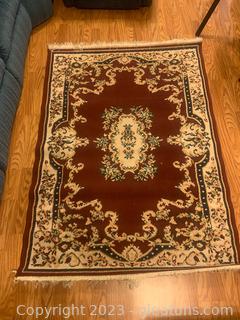 Red and Tan Area Rug