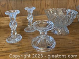 Four Crystal Pieces Including A Pineapple Pedestal and Three Candle Holders 