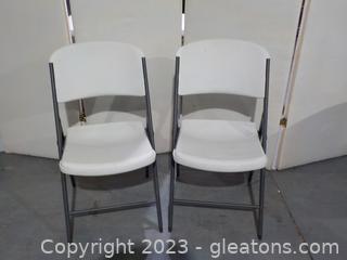 Pair of Folding Molded Plastic chairs