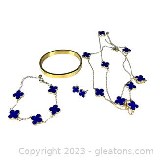 Gold Tone Fashion Jewelry with Blue Clovers 