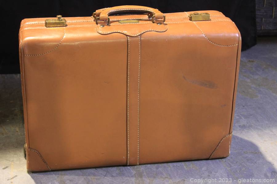 Sold at Auction: A Vintage Suitcase