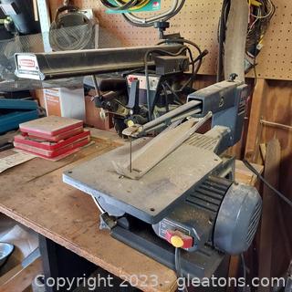 2 Craftsman Saws and table
