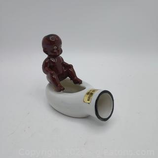 Figural Baby on Bedpan Ashtray “For old Butts and Ashes” 