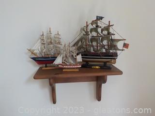 Three Model Schooner One Labeled “Red Jacket” and a Wooden Shelf