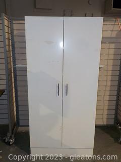 White Metal 4 Shelf-Storage Cabinet and It’s Contents 
