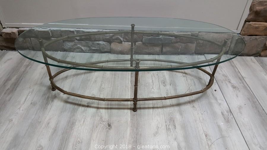 oval glass top coffee table with metal base