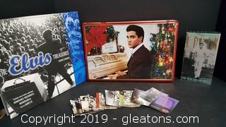 Lot Of Elvis Treasures Including About (20) The Elvis Collection Cards/Tin Box With VCR Tape/The Elvis Treasure Book